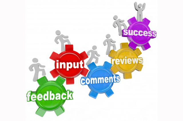 six cogs bearing the words, feedback, input, comments, reviews and success.