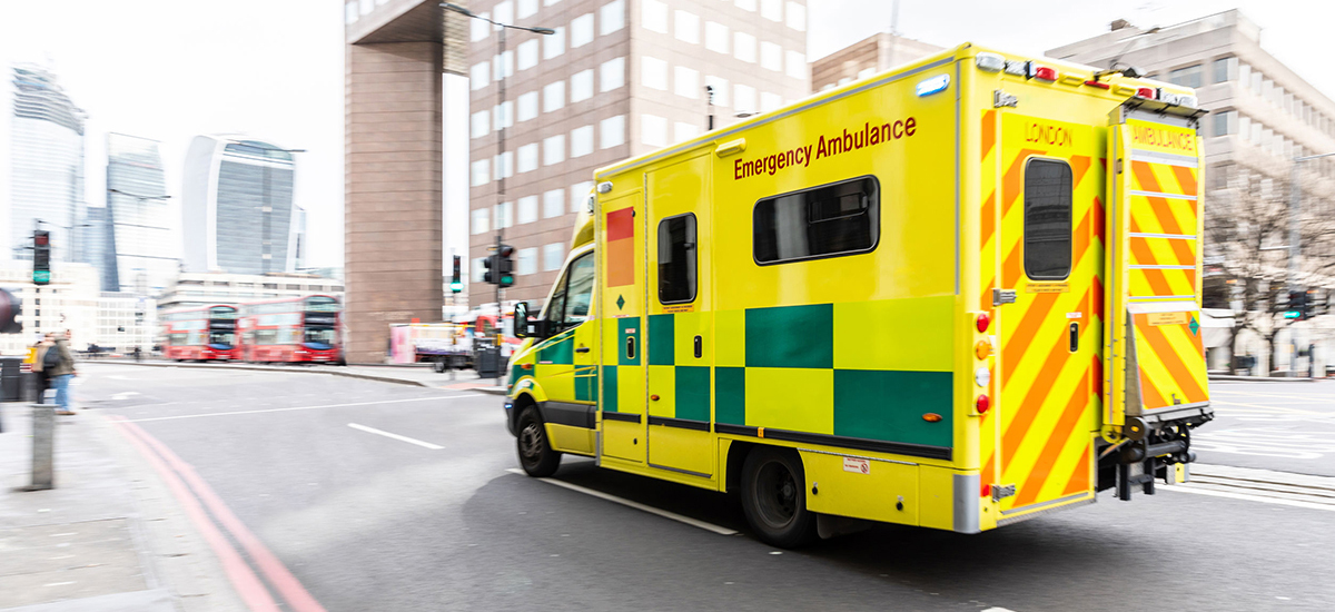 Slide Image of ambulance travelling along a road