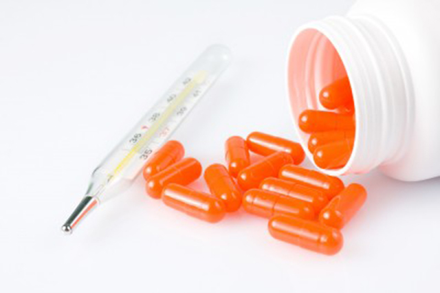 Image of orange-coloured capsules