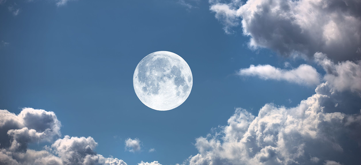 Slide Image of big moon against  broken cloud